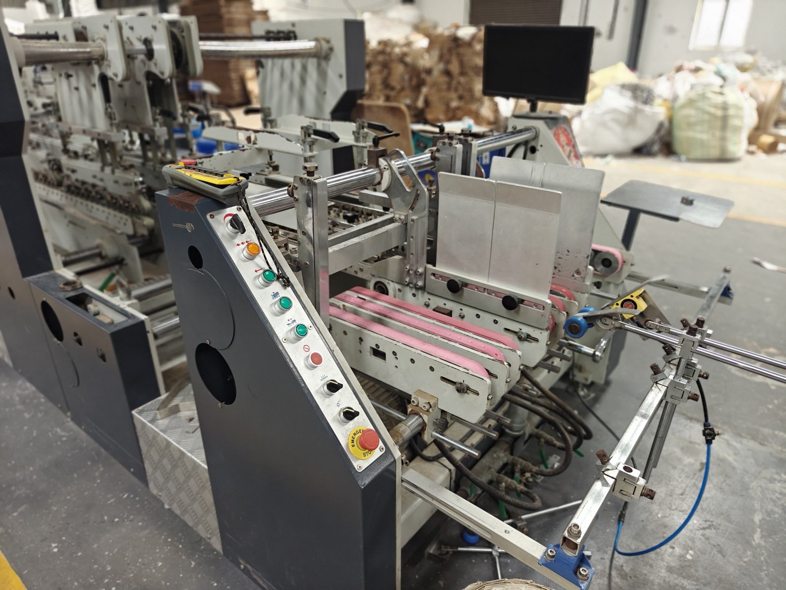 Advanced folding machine for box production by Corrugated Box Manufacturers in Sivakasi
