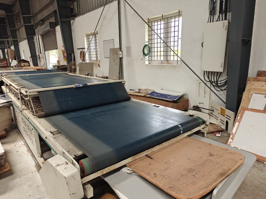 Die-cutting machine in operation at Moorthy Offset Printers – Corrugated Box Manufacturers in Sivakasi - Why choose corrugated boxes for packaging